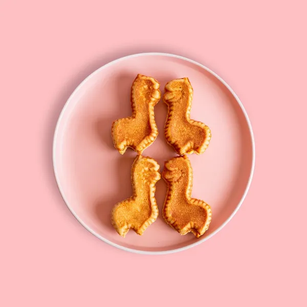 Cuatro Alpaca Pang en un plato